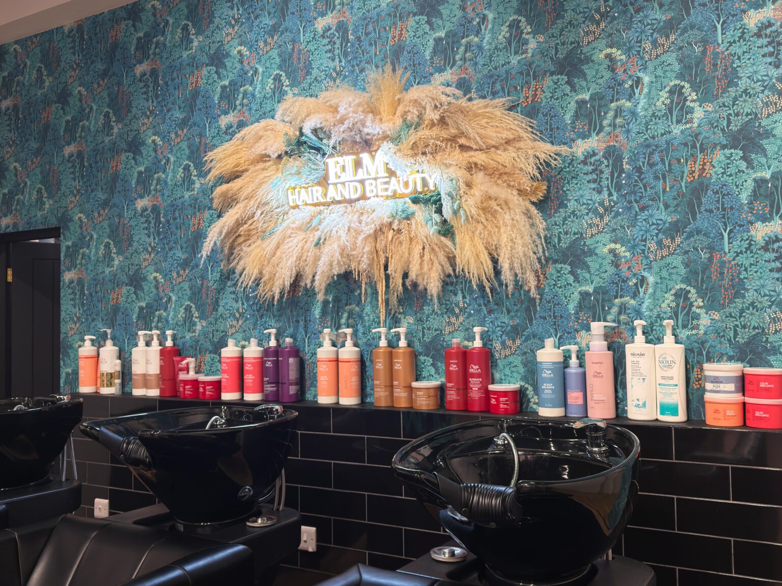 The backwash area and product shelves at ELM Hair and Beauty, Wrexham