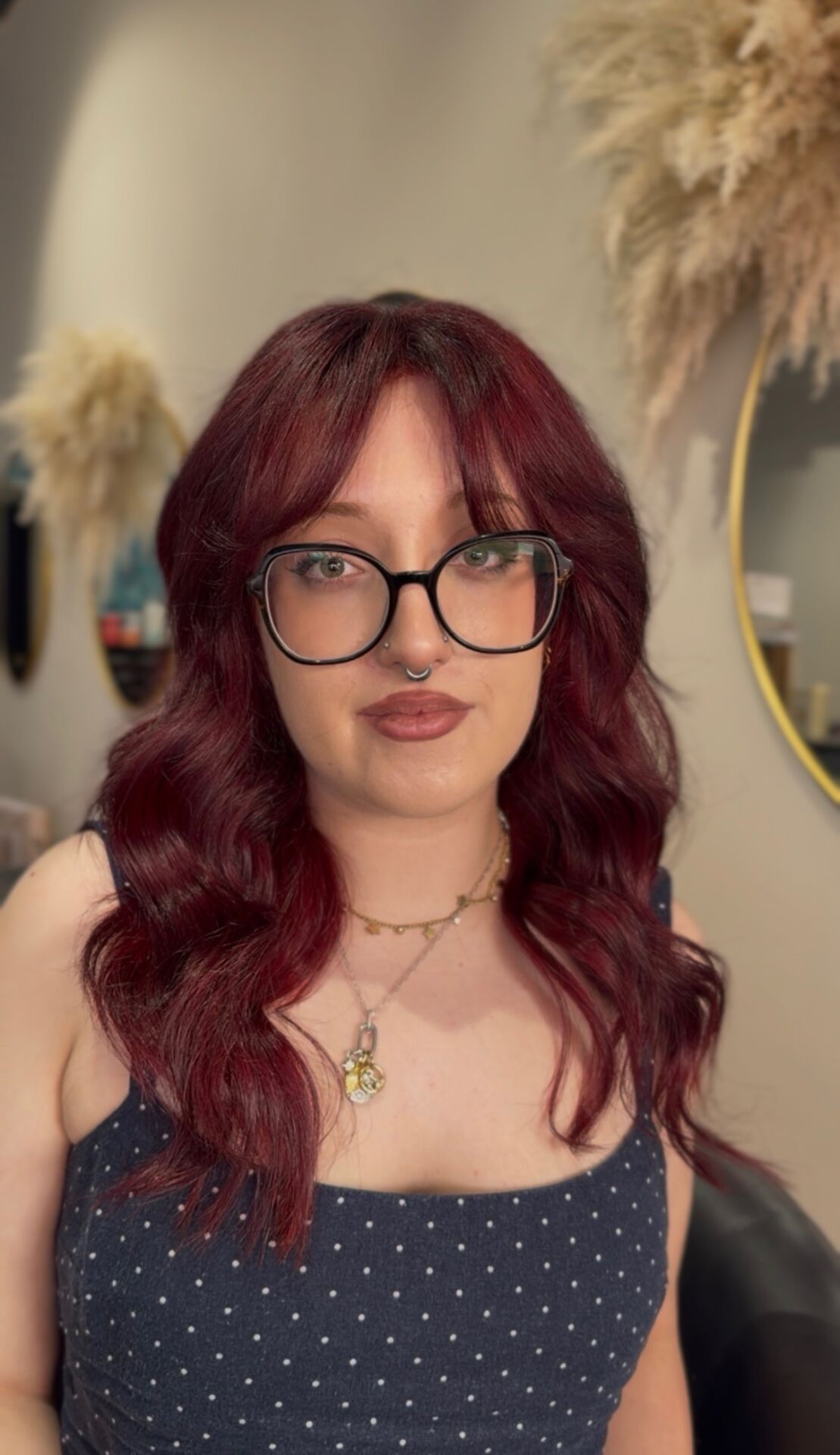 Deep cherry red hair colour with a fringe at ELM Hair and Beauty, Wrexham
