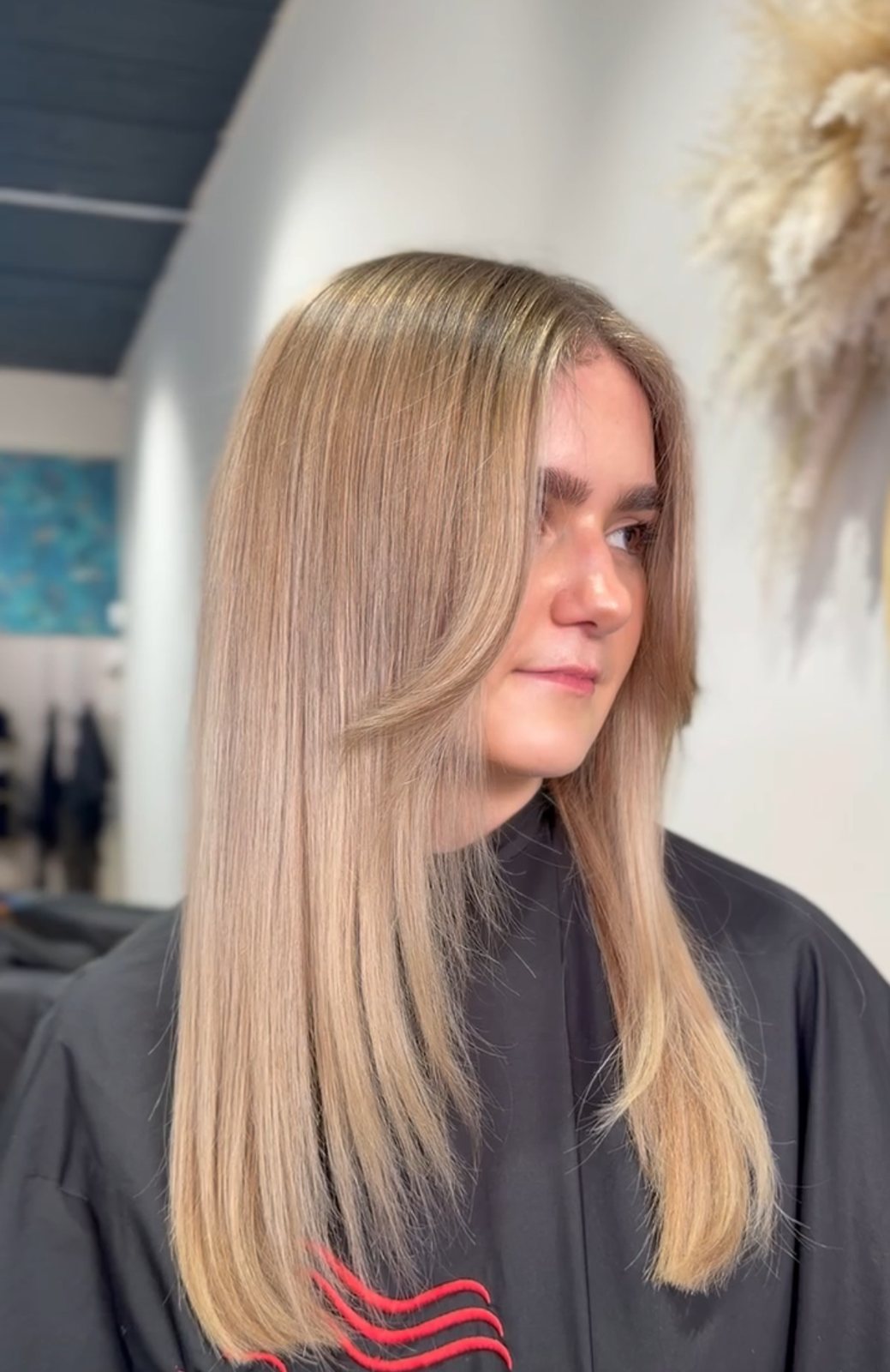 Natural blonde highlights on long straight hair at ELM Hair and Beauty, Wrexham
