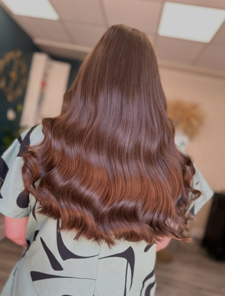 Long brunette hair extensions at ELM Hair and Beauty in Wrexham