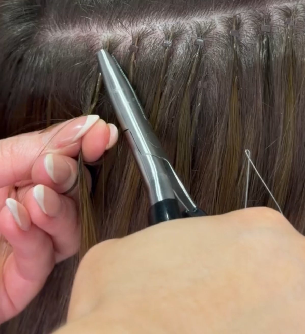 Nano ring hair extensions being fitted at ELM Hair and Beauty, Wrexham