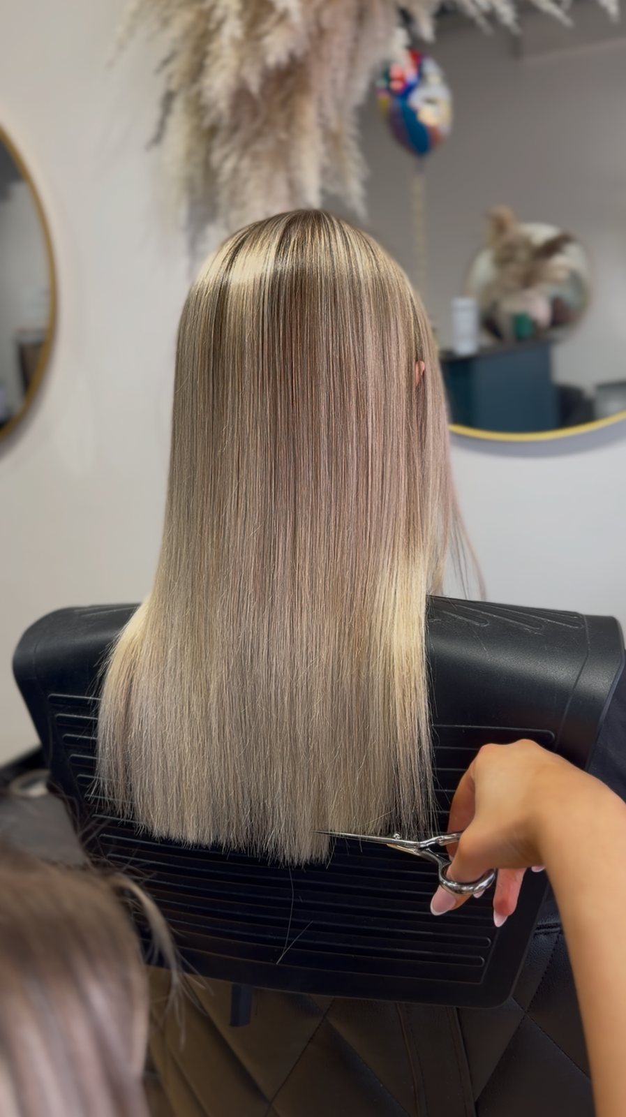Precision haircut in progress at ELM Hair and Beauty in Wrexham