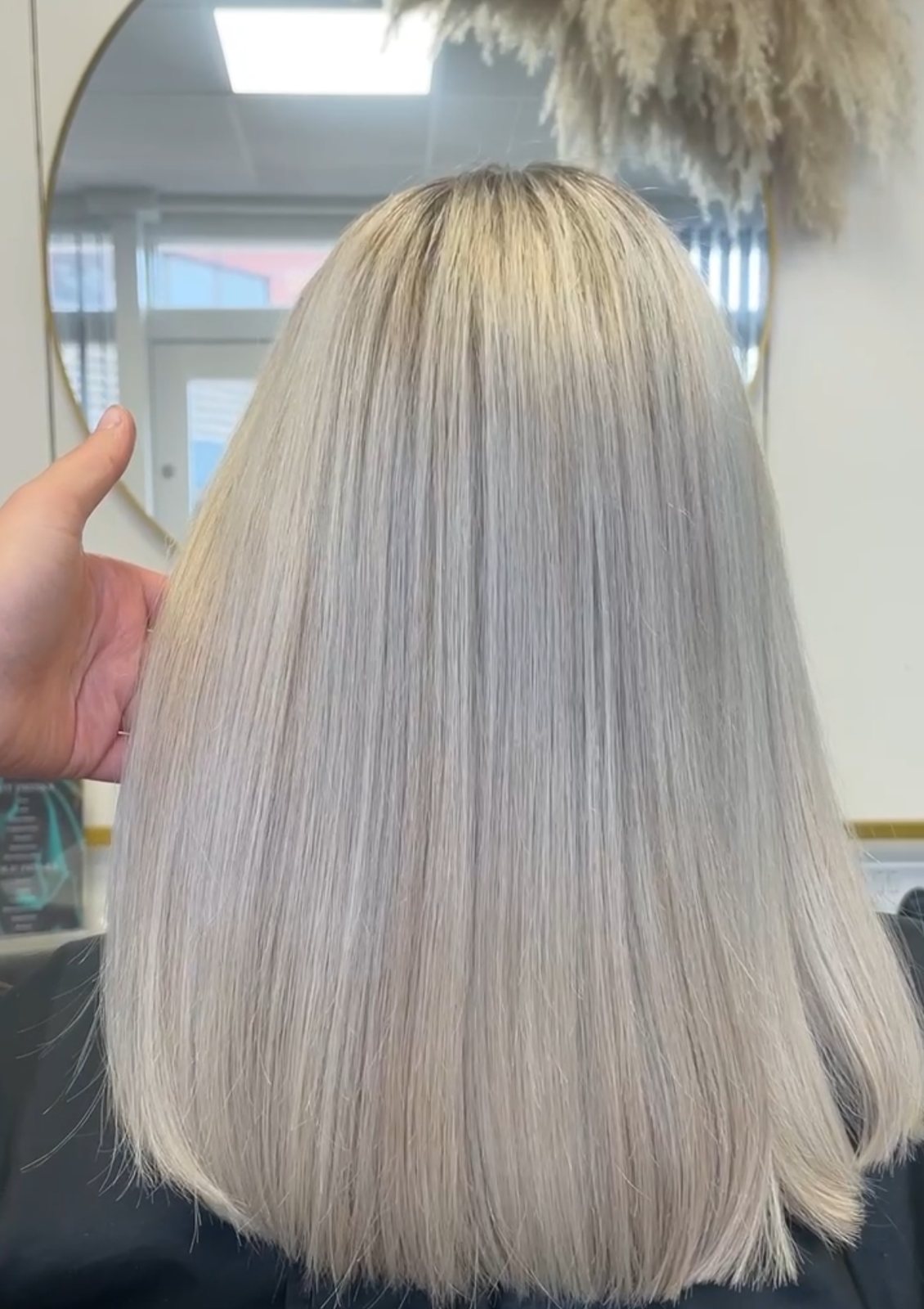 Sleek blonde highlights at ELM Hair and Beauty in Wrexham