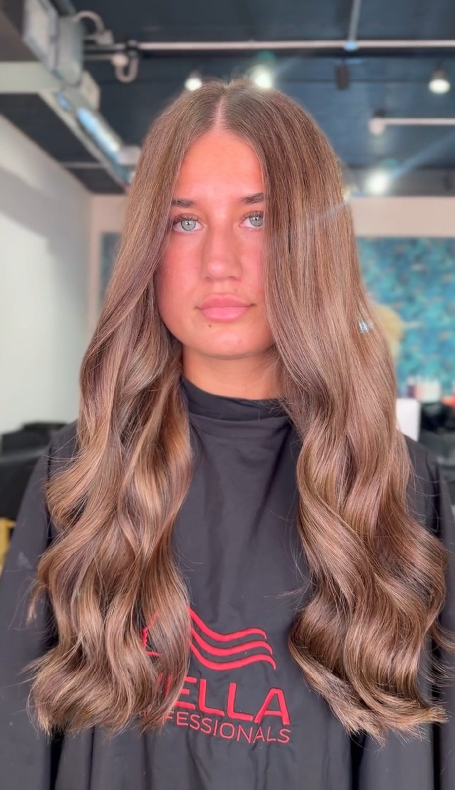 Natural sun-kissed balayage on light brown hair at ELM Hair and Beauty, Wrexham